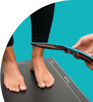 patient standing on gait scan plate